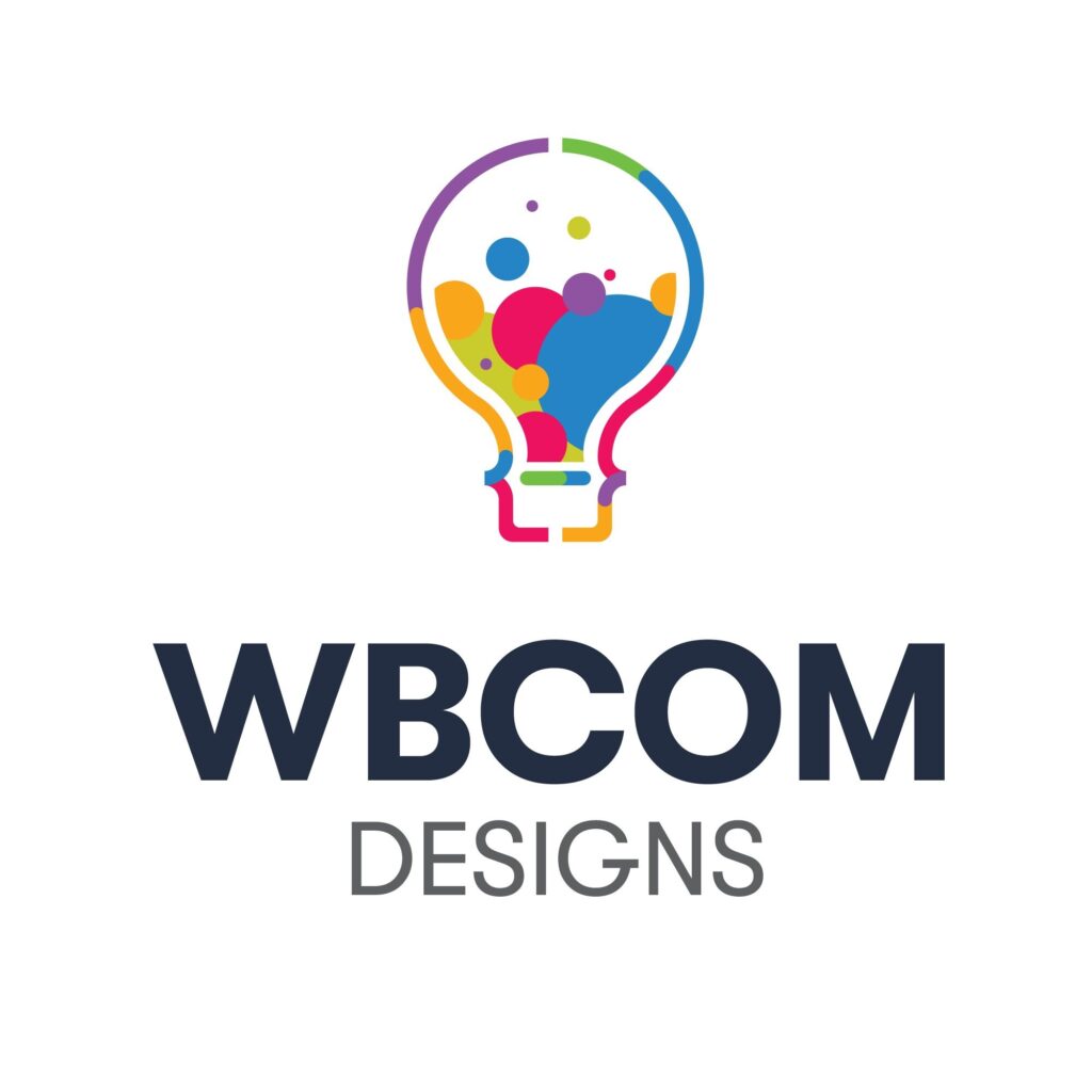 Logo with a colorful, abstract lightbulb made of circles and lines above the bold text WBCOM in dark blue and DESIGNS in gray below on a white background.